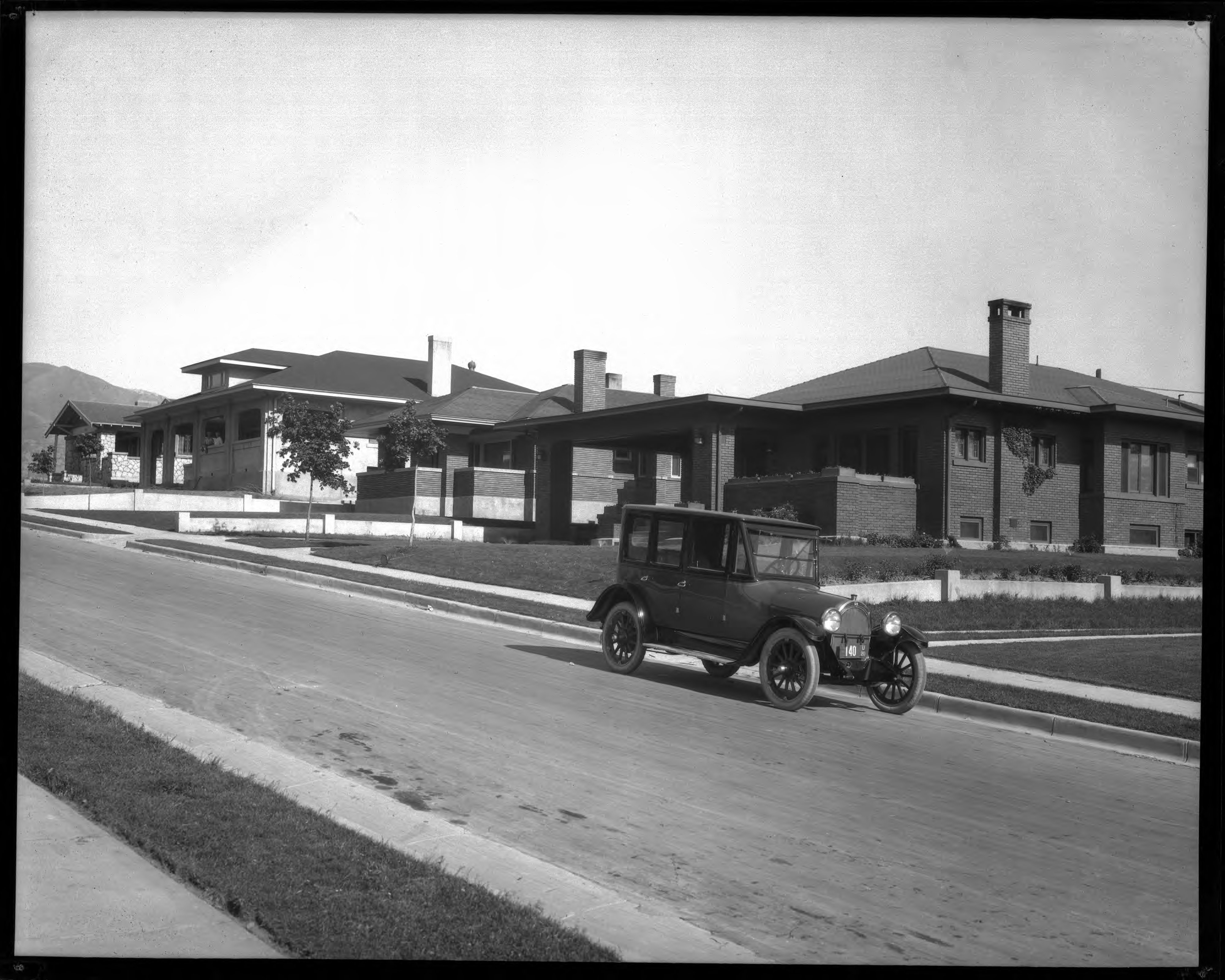 Tourssen & Co. Oldsmobile in front of 1352 E. Yale Avenue, May 31, 1920