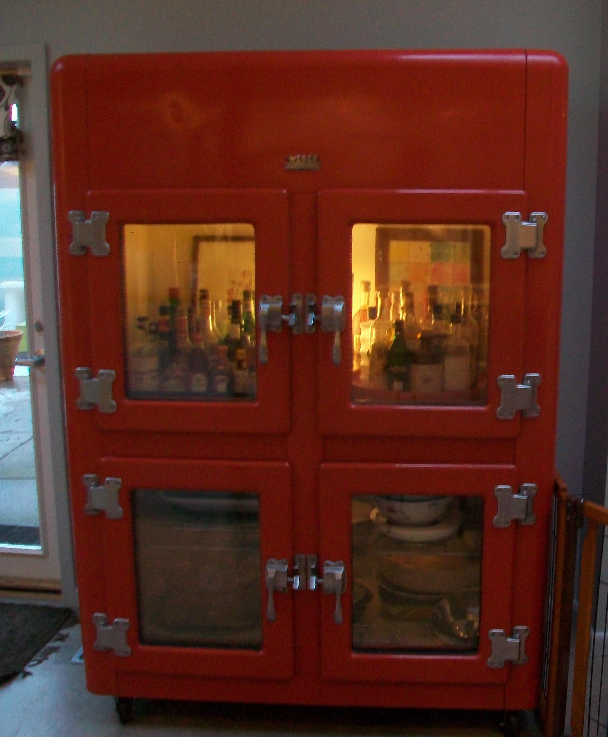 Now used for display and storage in kitchen area.